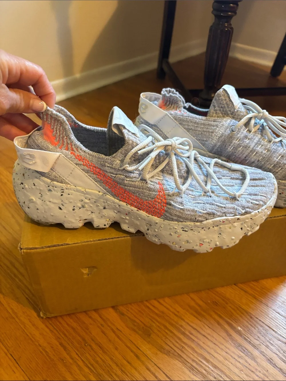 Nike Gray Flyknit Athletic Shoes with Orange Swoosh